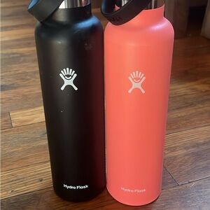 Hydro Flask Matte Black and Coral Bottles